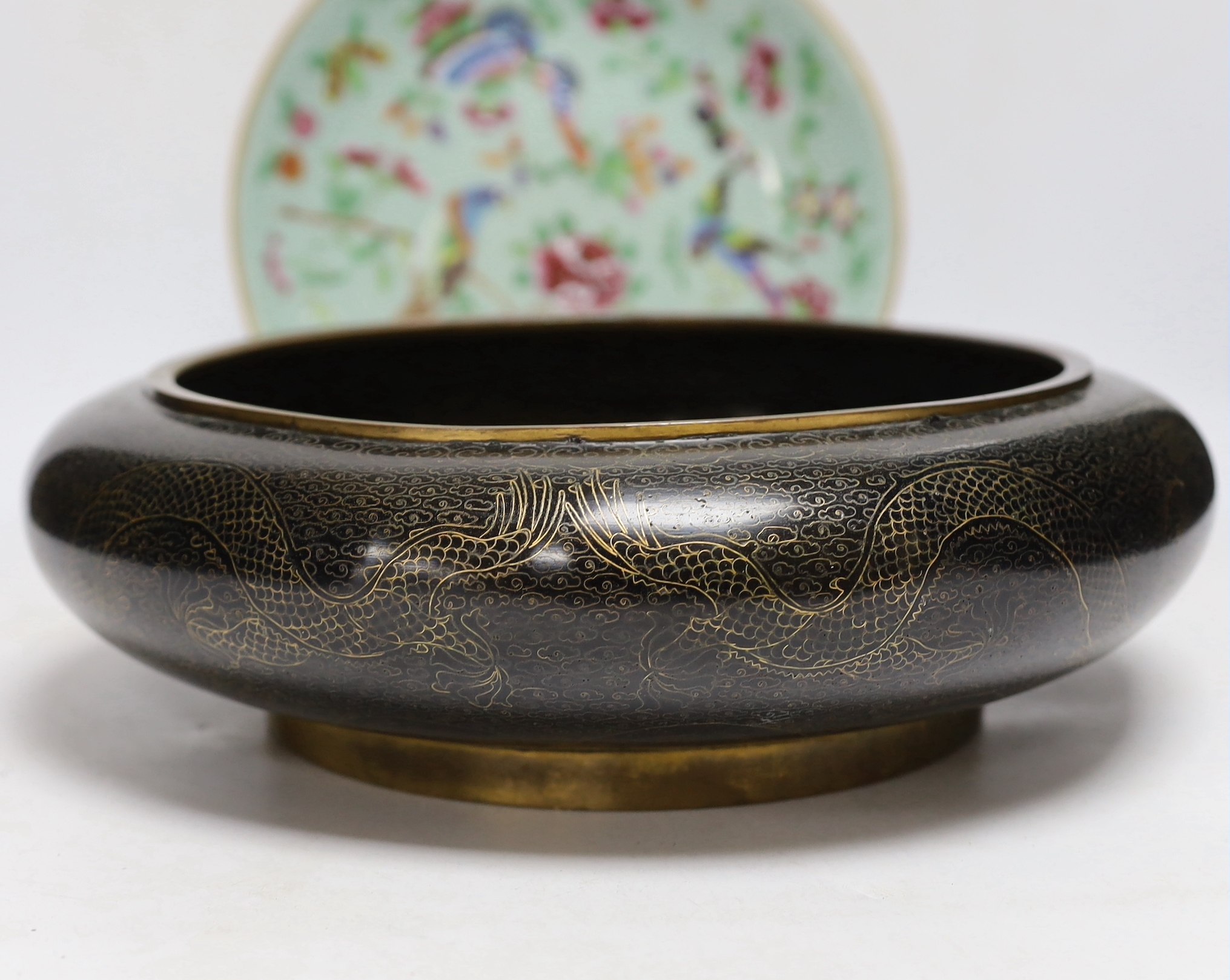 A Chinese famille rose plate and a cloisonné enamel bowl, bowl 30cm diameter